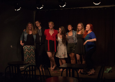 Cast of In Her Shoes standing on stage